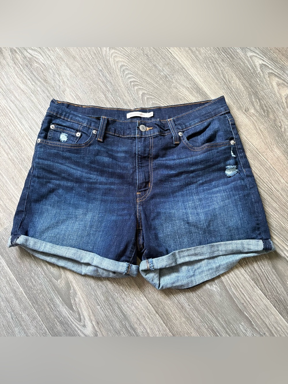 Levi’s mid length jean shorts cuffed